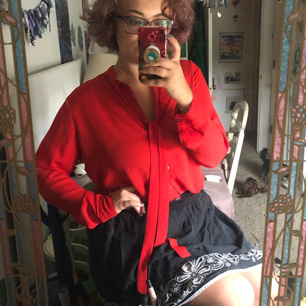 Red silky tie blouse